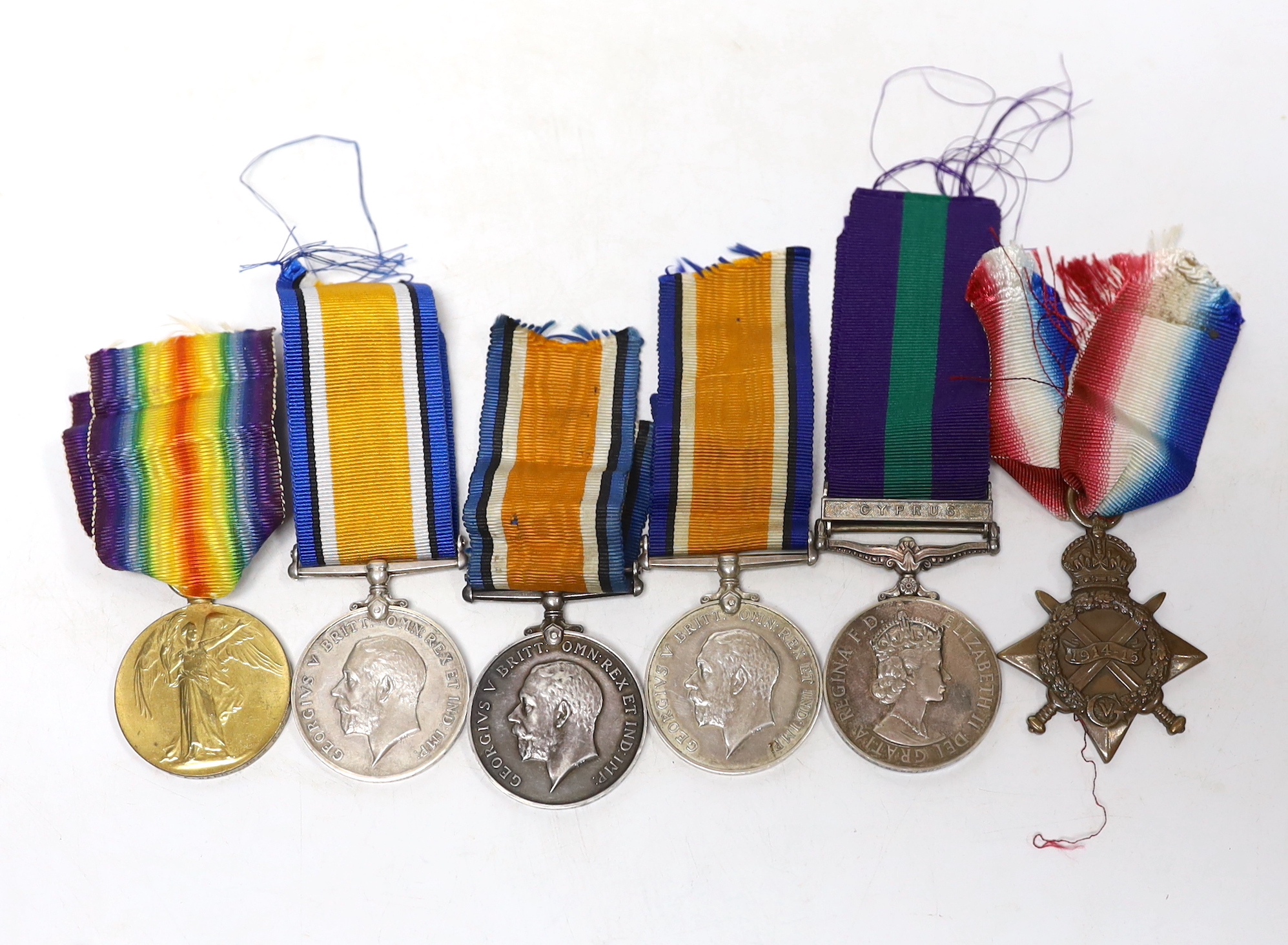 Six medals. Three WWI British War Medals, a Victory Medal, a 1914-15 Star, all named, together with a Capt. G.M. Harrison R.A. P.C., an Elizabeth II Cyprus General Service Medal